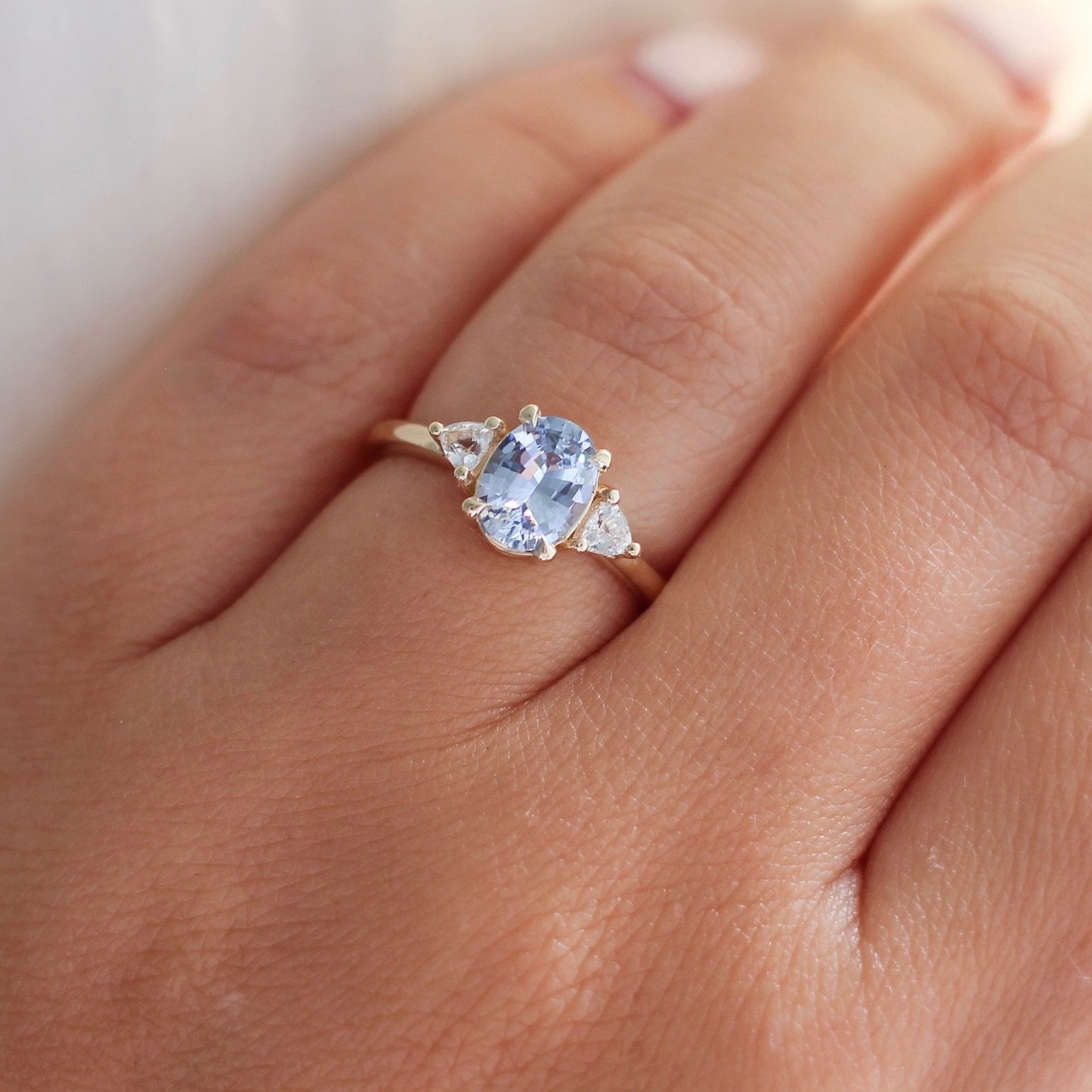 Blue oval sapphire engagement ring 