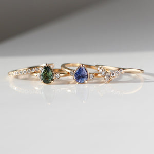 Pear Cut Purpleand Green Sapphire rings paired with Crown diamond band  