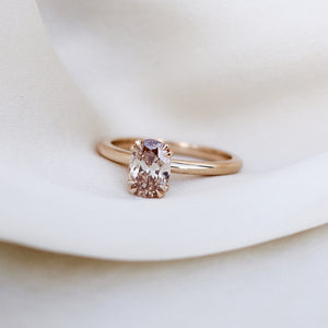 Oval Cut Diamond Ring front view on fabric