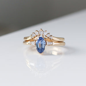 Shield Cut Blue Sapphire Ring paired with wave diamond band front view