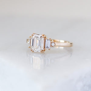 Emerald Cut Lab Diamond Ring quarter view on marble