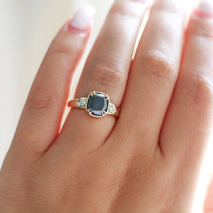 Cushion Cut Black Diamond Ring on hand 