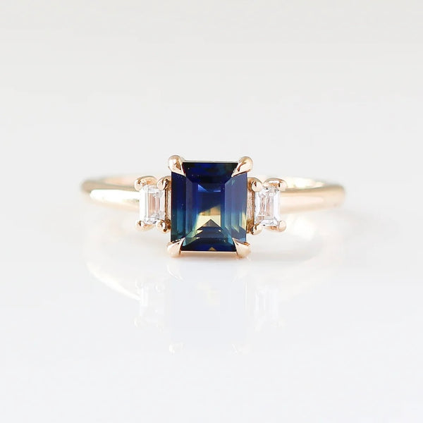 Emerald cut blue sapphire ring 
