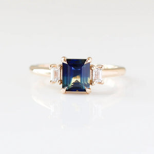 Emerald cut blue sapphire ring