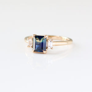 Emerald cut blue sapphire ring left side view