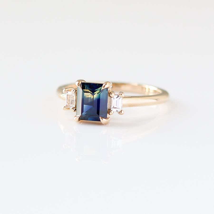 Emerald cut blue sapphire ring 